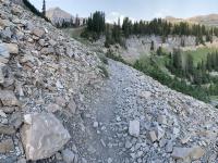 Near the top of the Giant Staircase. Mount Timpanogos is the peak on the left, Bomber Peak is the next highest (apparent) rounded peak in the right third of the skyline, followed by North Timpanogos at the far right.
