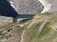You can see one of the original shelters still standing near the lake