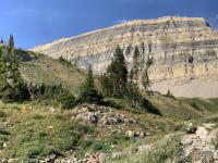 View of The Shoulder (left) and Mount Timpanogos (right). If you look closely, you can see the white metal shelter at the peak.