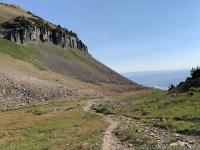 View east of the slope just below Robert's Horn from the meadow below Emerald Lake. You can see Deer Creek reservoir just below the horizon.