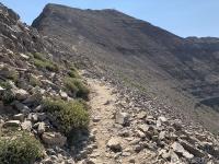 View just past Timpanogos Saddle toward Mount Timpanogos. The shelter is clearly visible here. Most of the hike is on the east side of the ridgeline trail, but from the saddle to the peak and then to South Timpanogos is on the west side of the ridge.